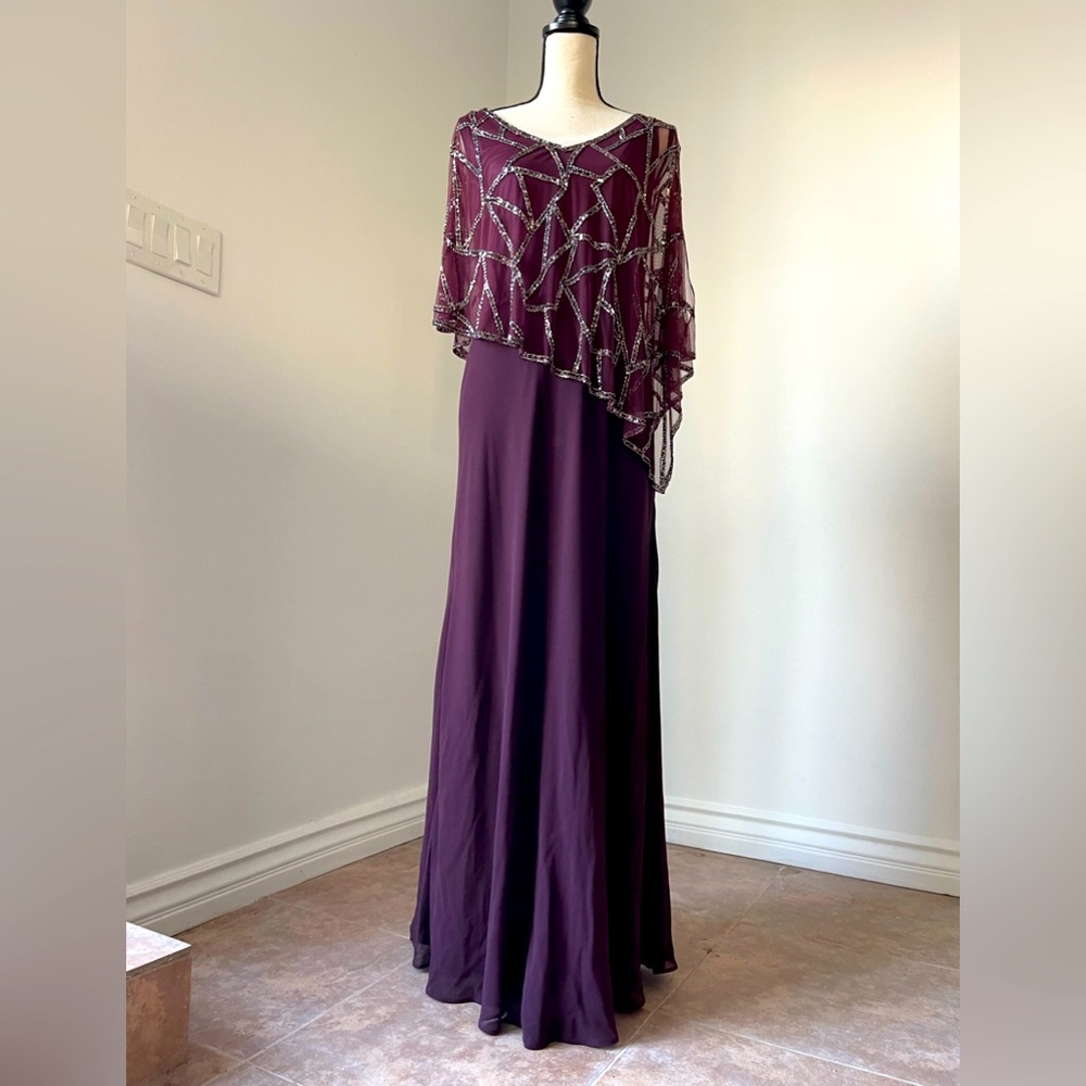 Jkara sleeveless beaded evening gown, size 10. 57 inches long.